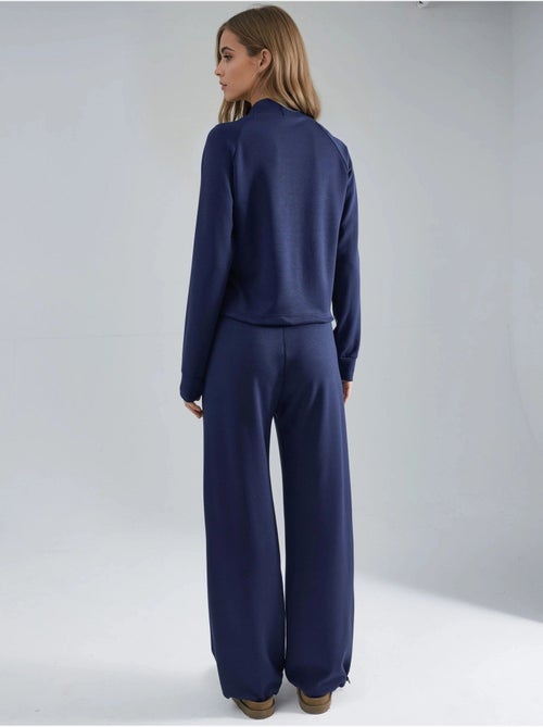 Blusa a mezzo collo modal touch e pantaloni con vita elasticizzata collezione bersan hiccup - Kiabi Blusa a mezzo collo modal touch e pantaloni con vita elasticizzata collezione bersan hiccup - Kiabi