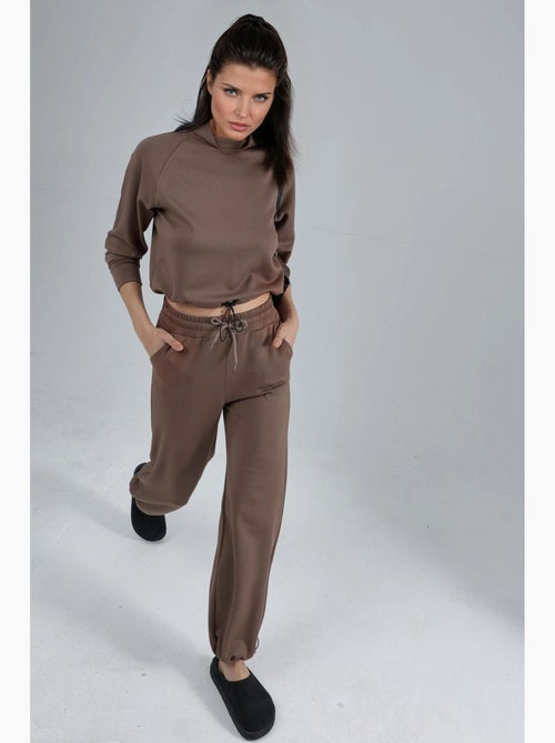 Blusa a mezzo collo modal touch e pantaloni con vita elasticizzata collezione bersan hiccup - Kiabi Blusa a mezzo collo modal touch e pantaloni con vita elasticizzata collezione bersan hiccup - Kiabi