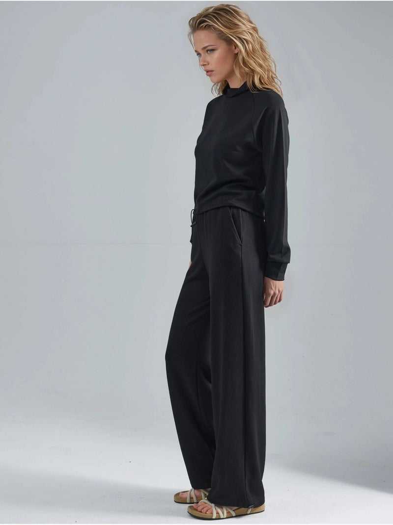 Blusa a mezzo collo modal touch e pantaloni con vita elasticizzata collezione bersan hiccup Nero - Kiabi
