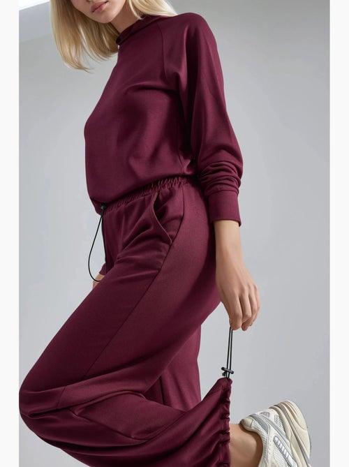 Blusa a mezzo collo modal touch e pantaloni con vita elasticizzata collezione bersan hiccup - Kiabi Blusa a mezzo collo modal touch e pantaloni con vita elasticizzata collezione bersan hiccup - Kiabi