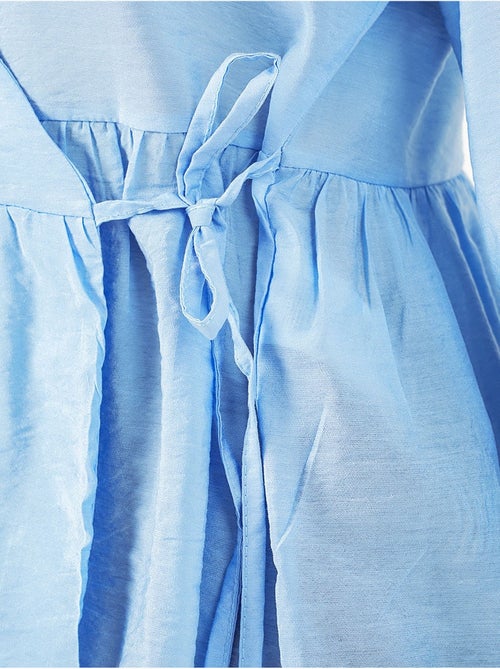 Blusa a portafoglio in crepe con scollo a v e dettaglio fiocco bdart - Kiabi Blusa a portafoglio in crepe con scollo a v e dettaglio fiocco bdart - Kiabi