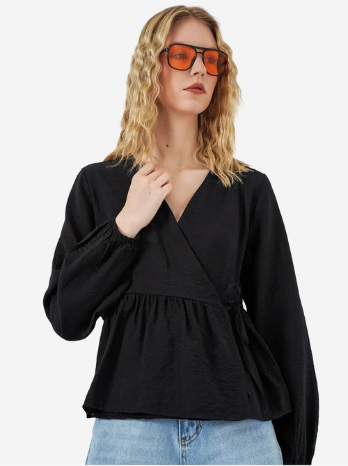 Blusa a portafoglio in crepe con scollo a v e dettaglio fiocco bdart - Kiabi Blusa a portafoglio in crepe con scollo a v e dettaglio fiocco bdart - Kiabi