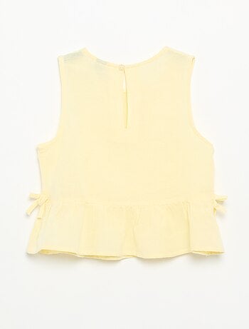 Blusa a righe con fiocchi fantasia
