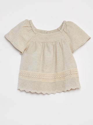Blusa con bottoni e ricamo