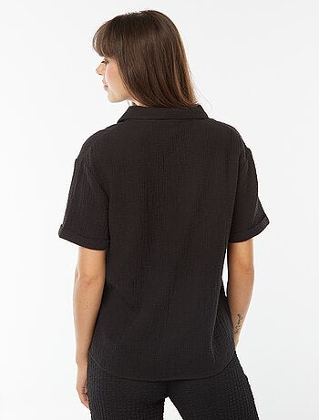 Blusa con colletto a polo in maglia effetto crêpe