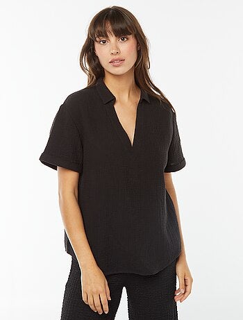 Blusa con colletto a polo in maglia effetto crêpe