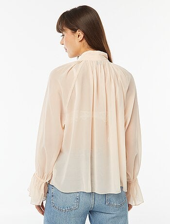 Blusa con collo a fiocco e maniche con volant