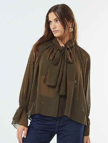 Blusa con collo a fiocco e maniche con volant