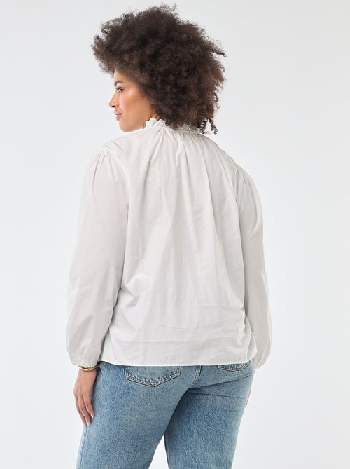 Blusa con collo alto a volant - Kiabi