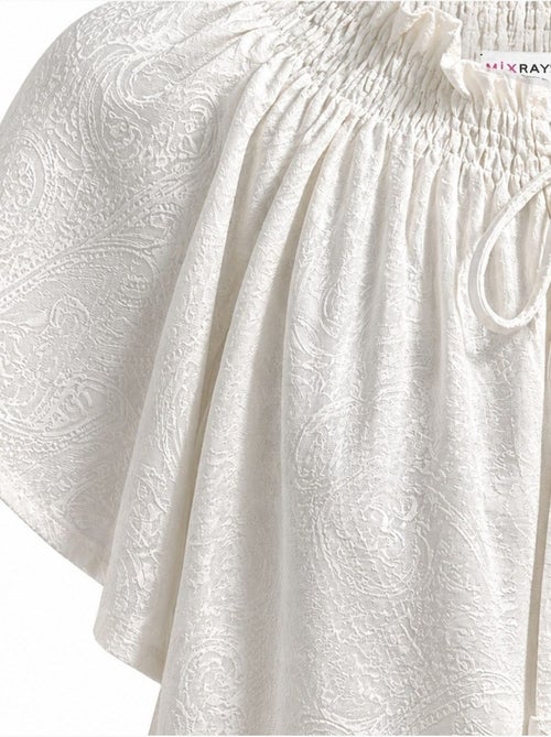 Blusa con girocollo e stampa paisley con dettaglio a fiocco mixray - Kiabi Blusa con girocollo e stampa paisley con dettaglio a fiocco mixray - Kiabi
