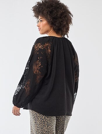 Blusa con maniche lunghe in pizzo e apertura con laccetti al collo