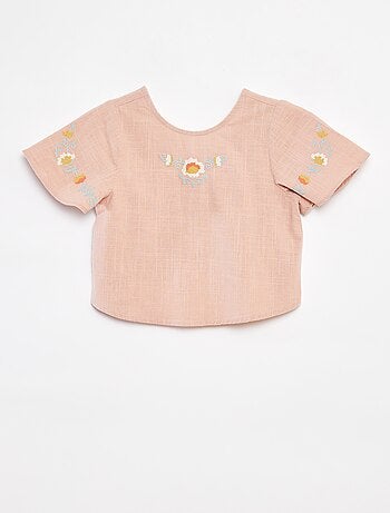 Blusa con motivi ricamati