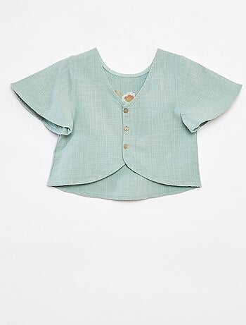Blusa con motivi ricamati