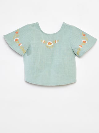 Blusa con motivi ricamati