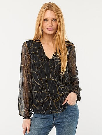Blusa con motivo e fili argentati in maglia fluida trasparente