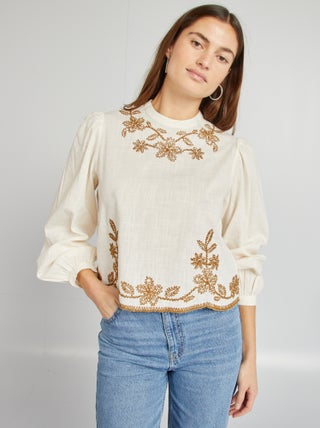 Blusa con ricami