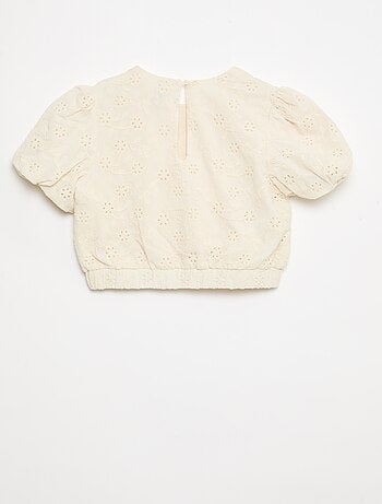 Blusa con ricami floreali a maniche corte