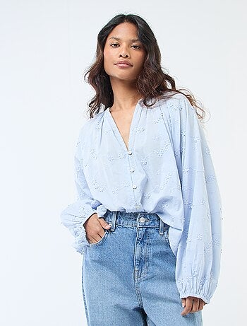 Blusa con ricami floreali