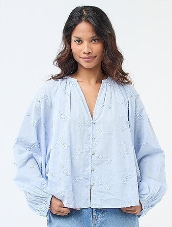 Blusa con ricami floreali