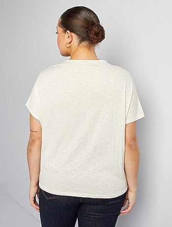 Blusa con ricami in tessuto effetto crêpe