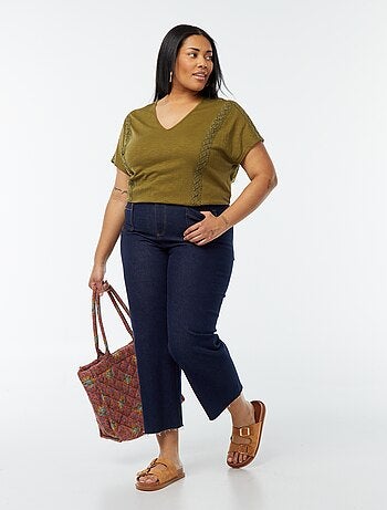 Blusa con ricami in tessuto effetto crêpe