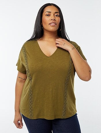 Blusa con ricami in tessuto effetto crêpe