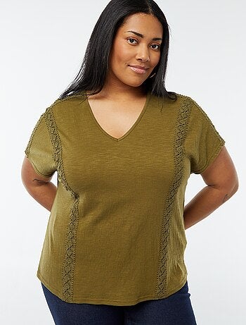 Blusa con ricami in tessuto effetto crêpe