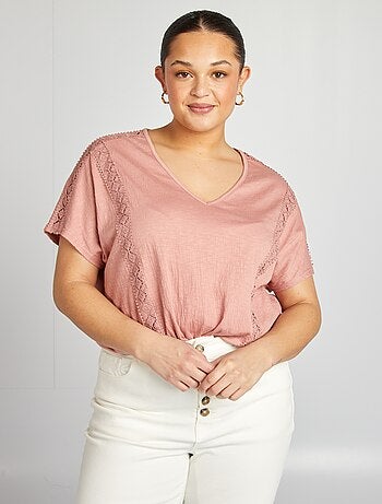 Blusa con ricami in tessuto effetto crêpe