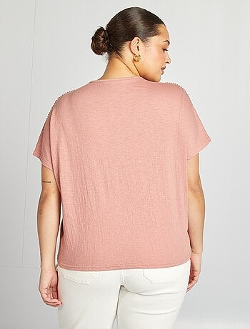 Blusa con ricami in tessuto effetto crêpe