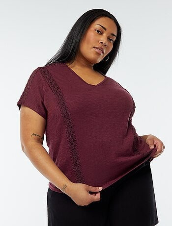 Blusa con ricami in tessuto effetto crêpe