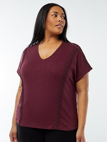 Blusa con ricami in tessuto effetto crêpe