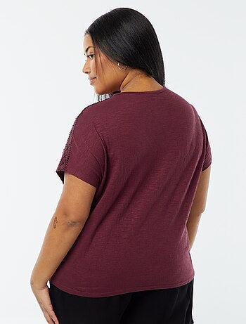 Blusa con ricami in tessuto effetto crêpe