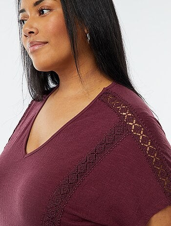 Blusa con ricami in tessuto effetto crêpe