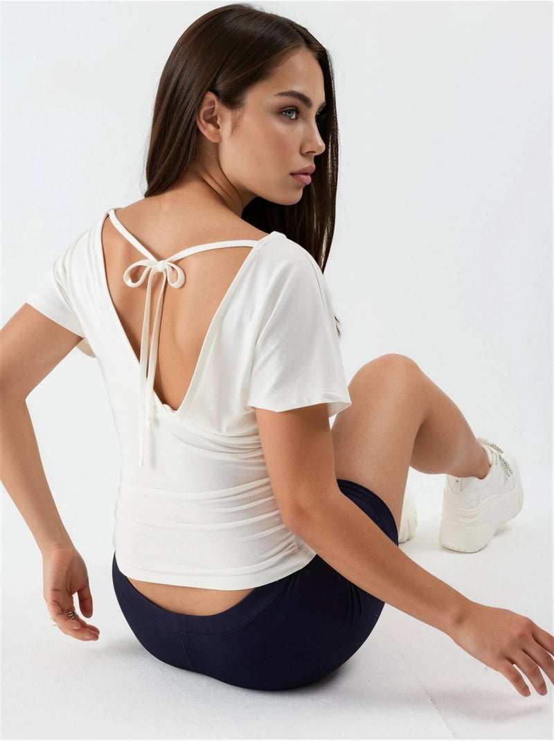 Blusa con scollo a v e dettaglio fiocco busem Bianco - Kiabi