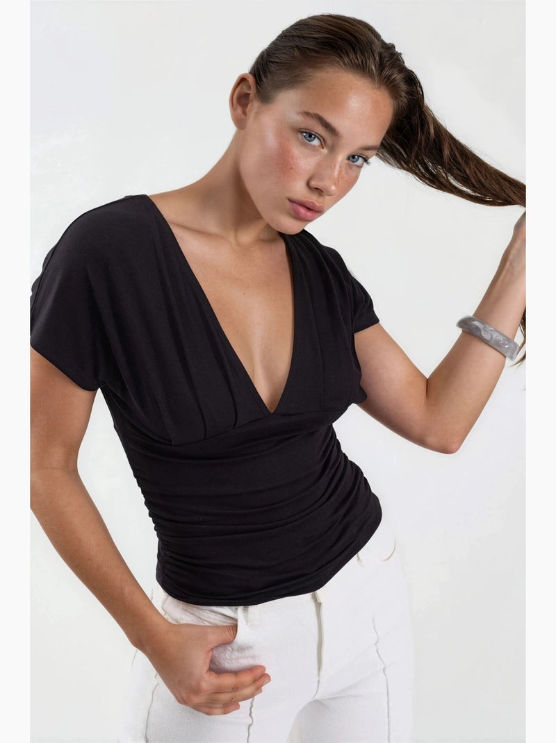 Blusa con scollo a v e dettaglio fiocco busem Nero - Kiabi