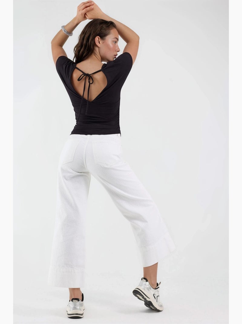 Blusa con scollo a v e dettaglio fiocco busem Nero - Kiabi