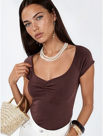 Blusa con scollo a v e maniche corte con drappeggio busem