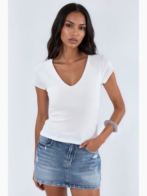 Blusa con scollo a v in misto modal e cotone busem - Kiabi Blusa con scollo a v in misto modal e cotone busem - Kiabi