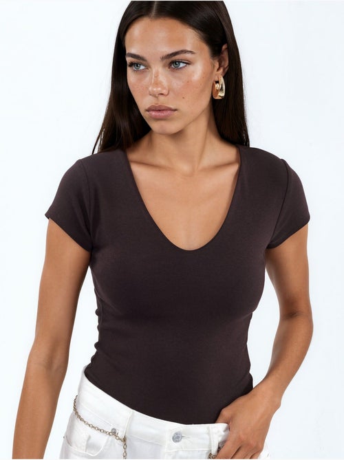 Blusa con scollo a v in misto modal e cotone busem - Kiabi Blusa con scollo a v in misto modal e cotone busem - Kiabi