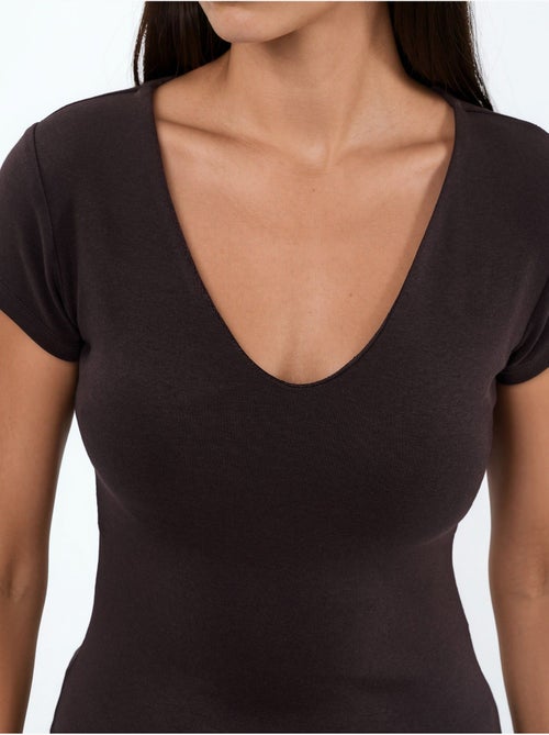 Blusa con scollo a v in misto modal e cotone busem - Kiabi Blusa con scollo a v in misto modal e cotone busem - Kiabi