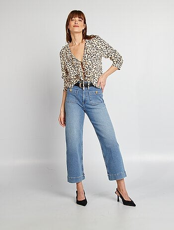 Blusa con volant da annodare