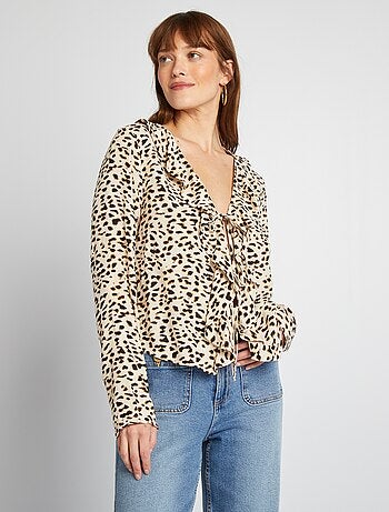 Blusa con volant da annodare
