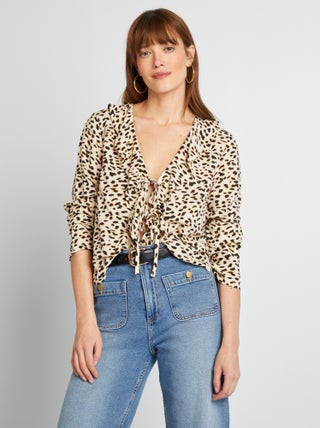 Blusa con volant da annodare