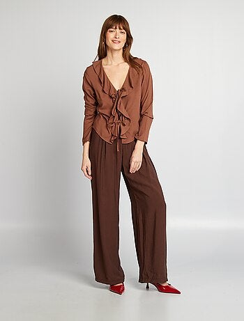 Blusa con volant da annodare