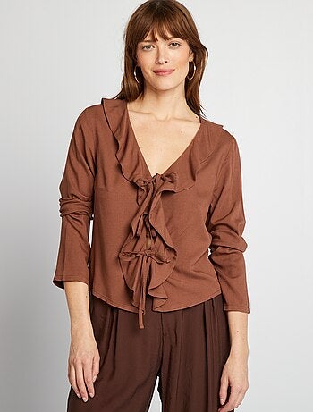 Blusa con volant da annodare