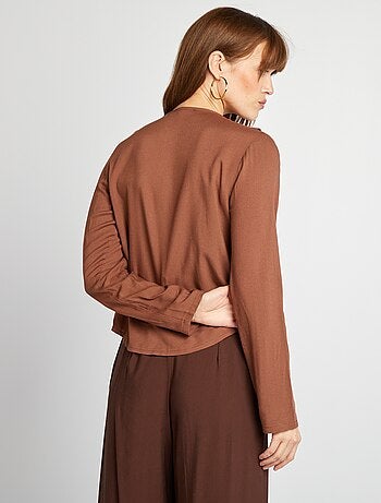 Blusa con volant da annodare