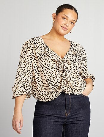 Blusa con volant e apertura con lacci