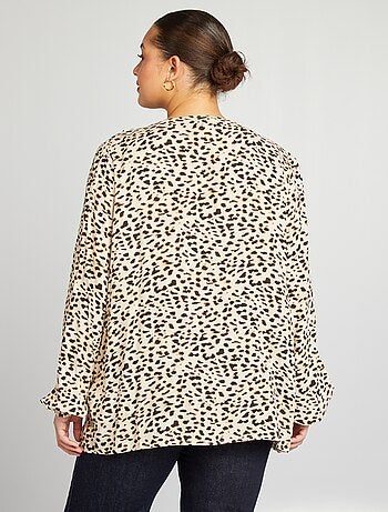 Blusa con volant e apertura con lacci