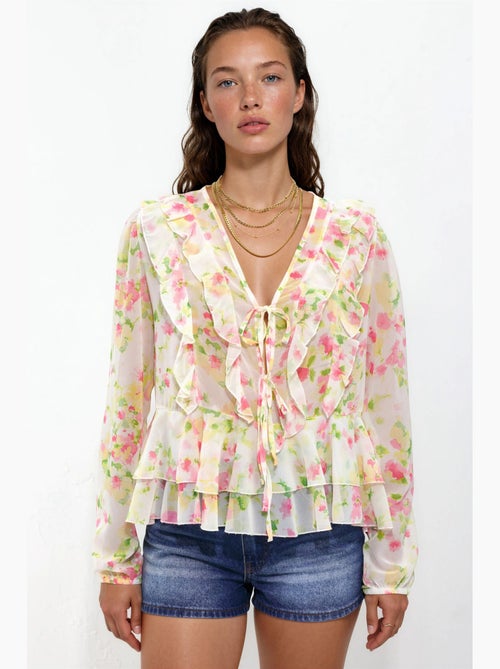 Blusa con volant, scollo a V e fantasia - Kiabi Blusa con volant, scollo a V e fantasia - Kiabi