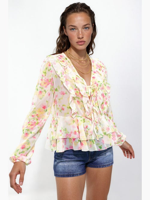 Blusa con volant, scollo a V e fantasia - Kiabi Blusa con volant, scollo a V e fantasia - Kiabi